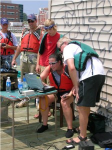 Dr. Mark Patterson providing oversight as teachers take turns surface driving the AUV