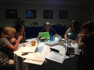 Teachers worked in groups to learn the lesson plans they will soon be teaching their students.